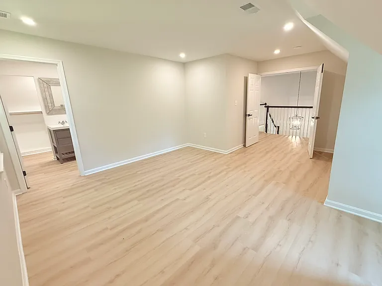Upstairs master bedroom with private bath and walk-in closet