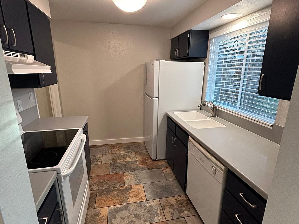 Kitchen cabinets are dark blue, color looks odd in photo sorry