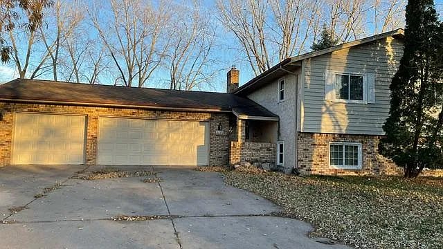 Front house 3 car garage