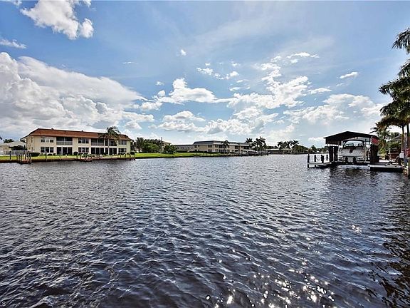 Fantastic water views all around with over 135 feet of seawall on this private cul de sac corner