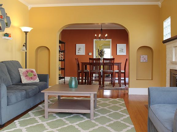Open, bright living room with picture windows
