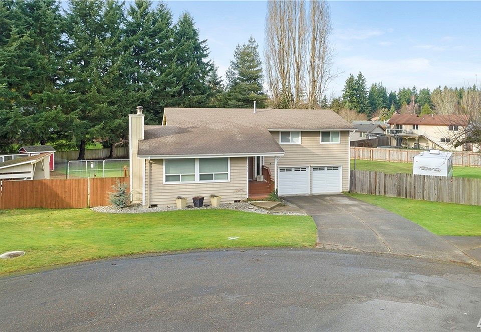 Welcome to this sprawling property that can be both your roomy retreat and urban farmstead!