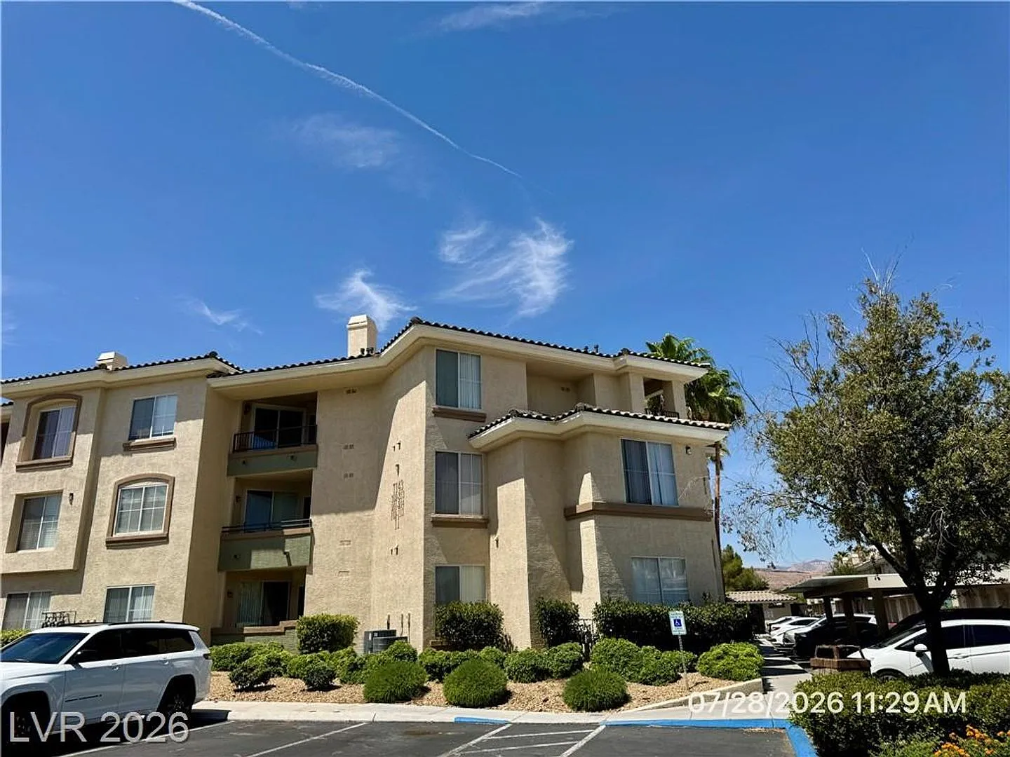 Gated Condo with Fireplace, Covered Patio & Resort-Style Amenities — Photo 1