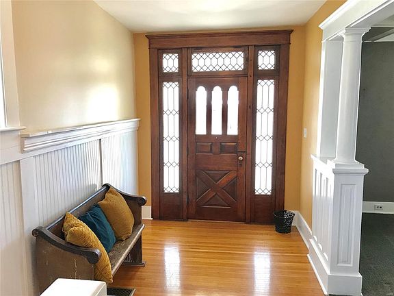 Entry with original leaded glass door.