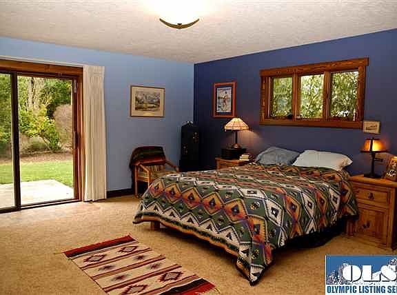 Master bedroom has a private patio facing the gardens. What a great place to have your morning coffe