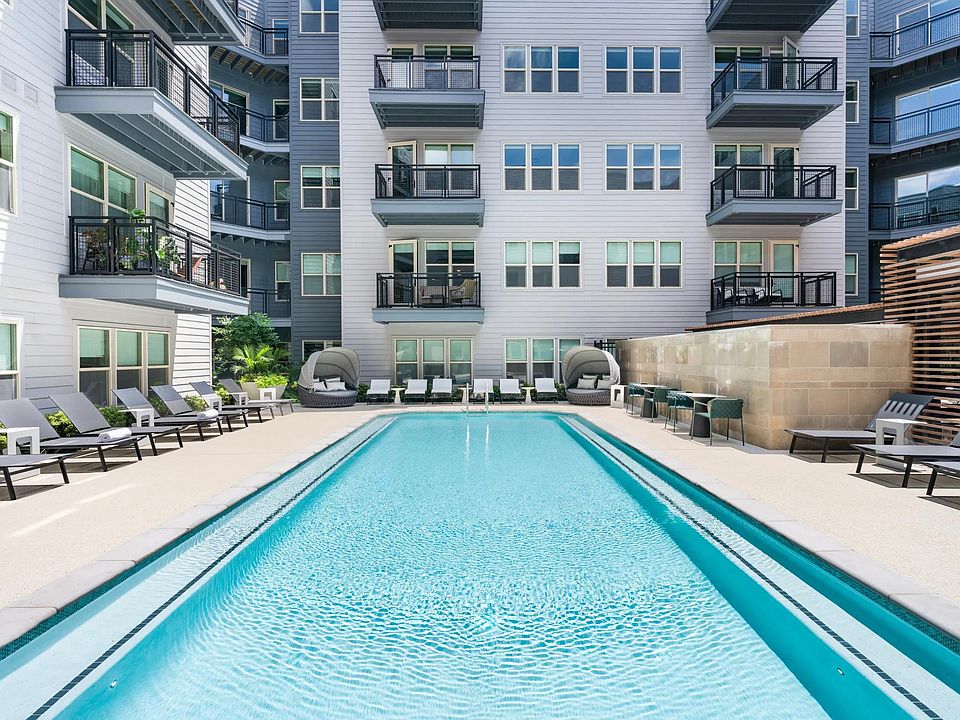 Soak up the sun or cool off in the crystal-clear pool_this courtyard oasis is your personal retreat, perfect for relaxing or entertaining.