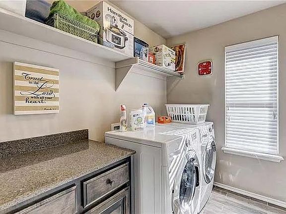 Lots of space/storage in the laundry room!! These are not the washer and dryer that are included in the house if needed.