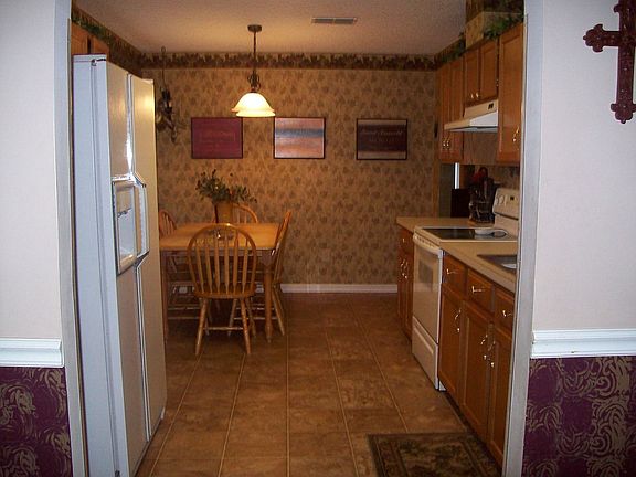 view of eat-in-kitchen from den/computer room