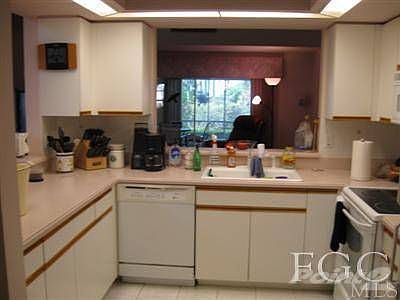View of the kitchen looking to lanai.