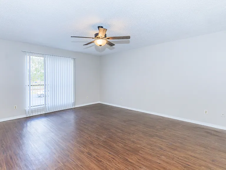 Huge beautiful Living area to our 3 bedroom apartment look at wood flooring!