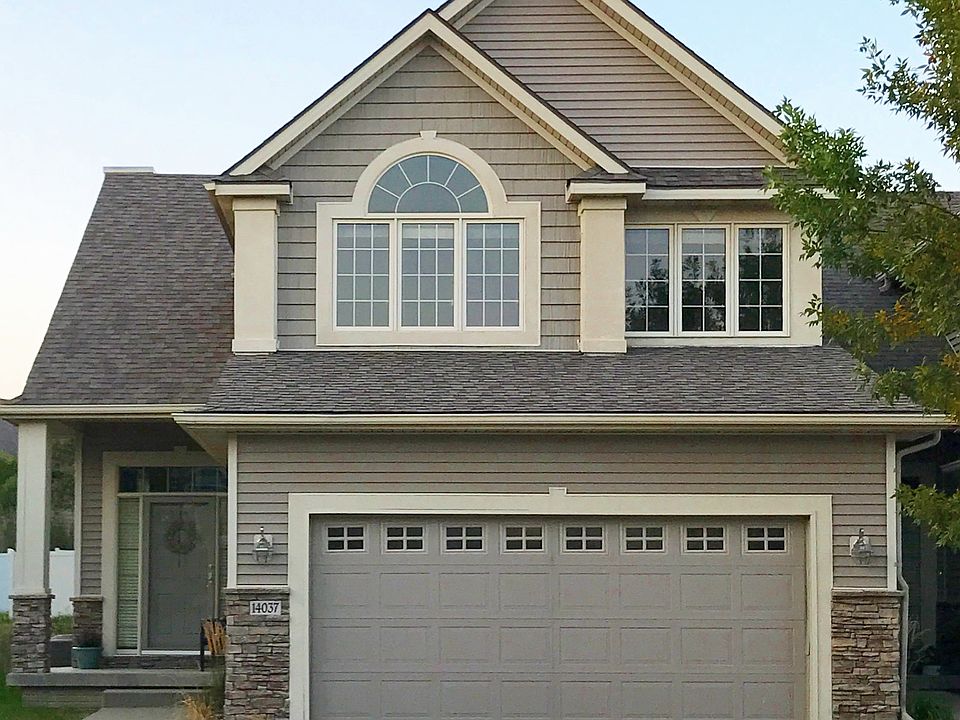 Front view, sits on a hill.