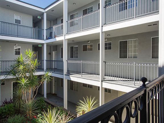 Inside courtyard showing newly painted building and walkways