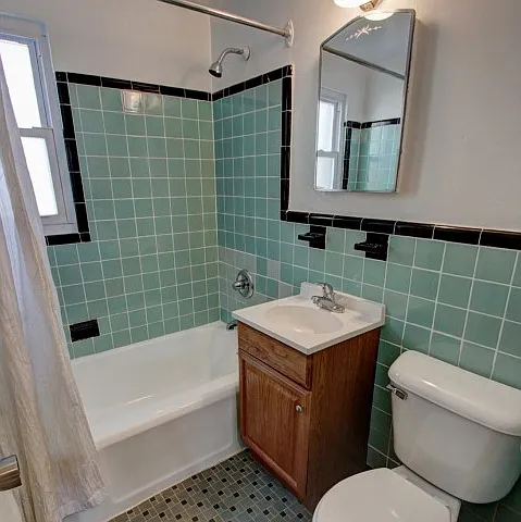 Bathrooms feature full tubs and ceramic tile