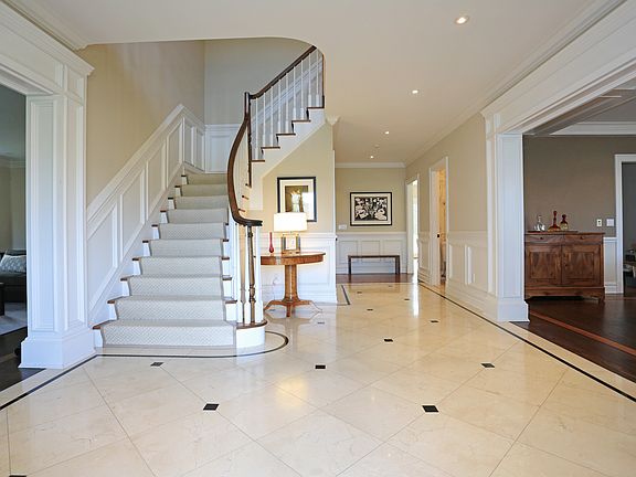Grand center hall with circular staircase