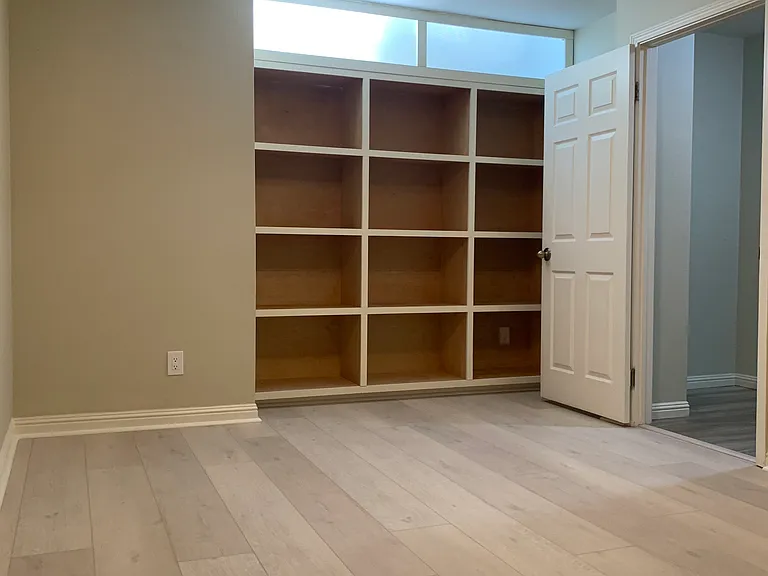 Bonus Room downstairs with newly installed hardwood floor