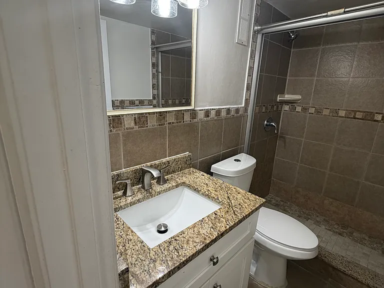 7710 NW 50th St #304 — Photo 12