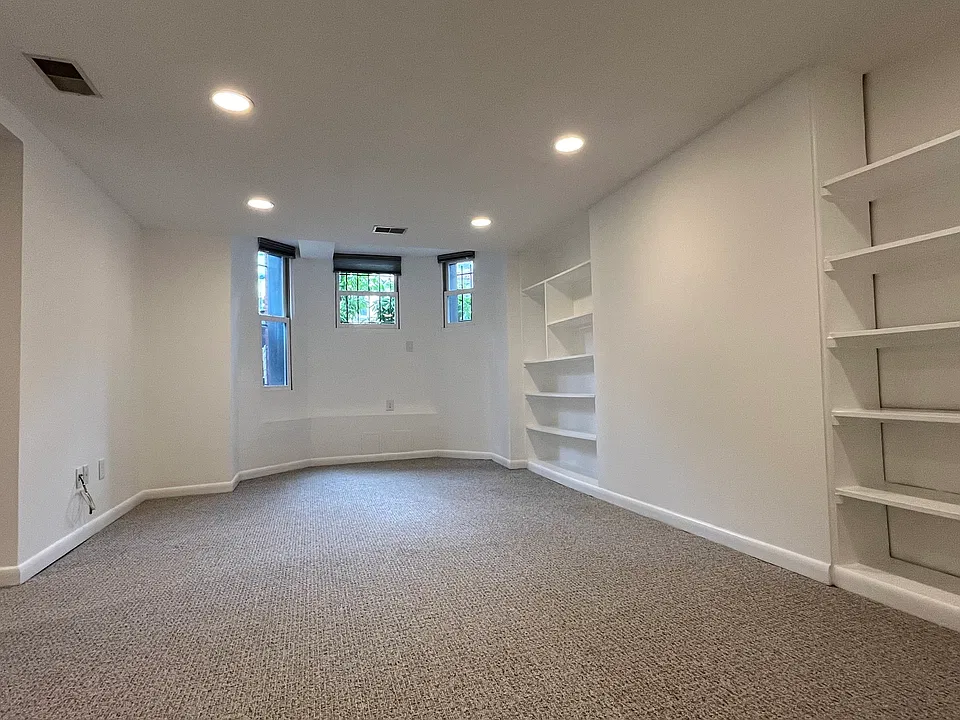 Living room with built-in shelving