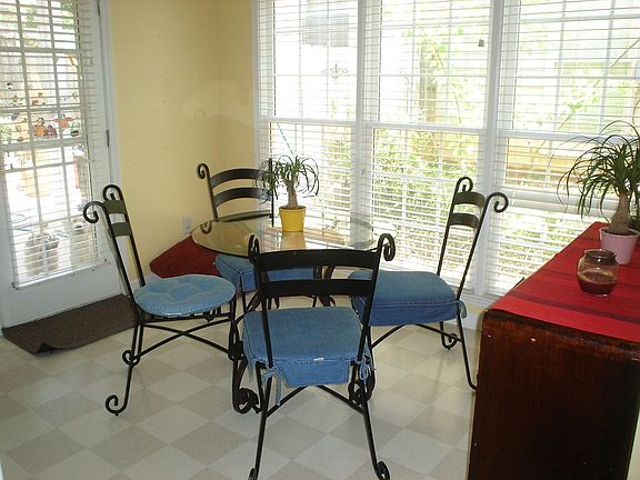 This breakfast room is filled with light to enjoy the beautiful view to the ba