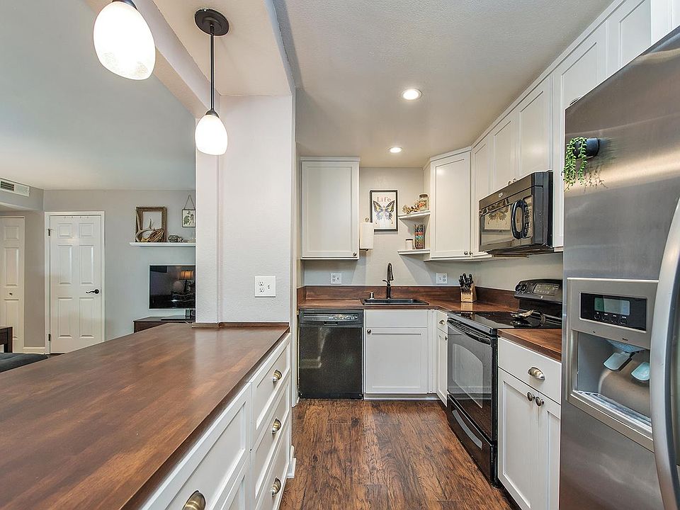 View to the kitchen from the dining nook.