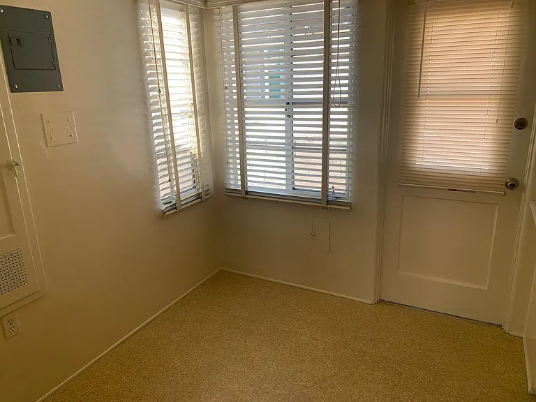 Breakfast nook with built-in ironing board