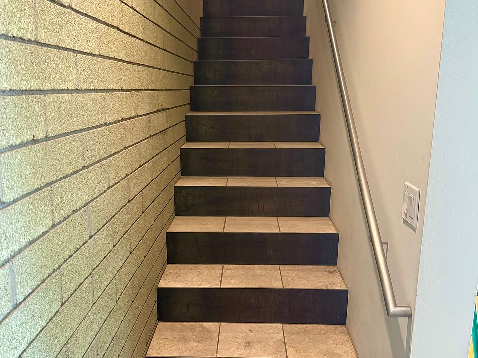 Stairwell up to level 2, main living space.