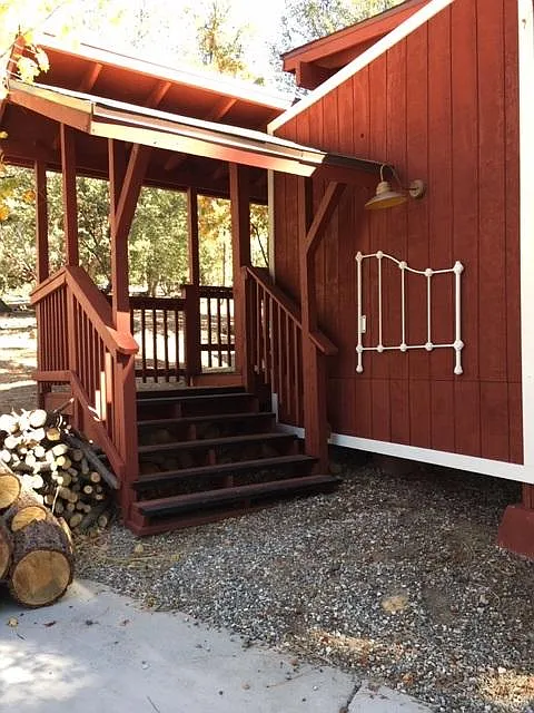 Stairs and covered walkway to the unit.