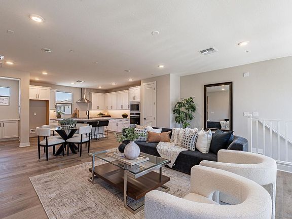 Great room seamlessly flows into expansive kitchen