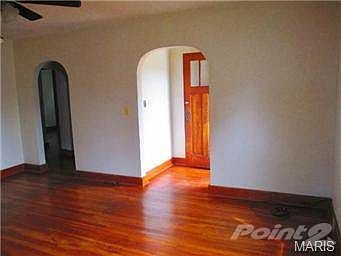 View of living room and front entrance into the home.