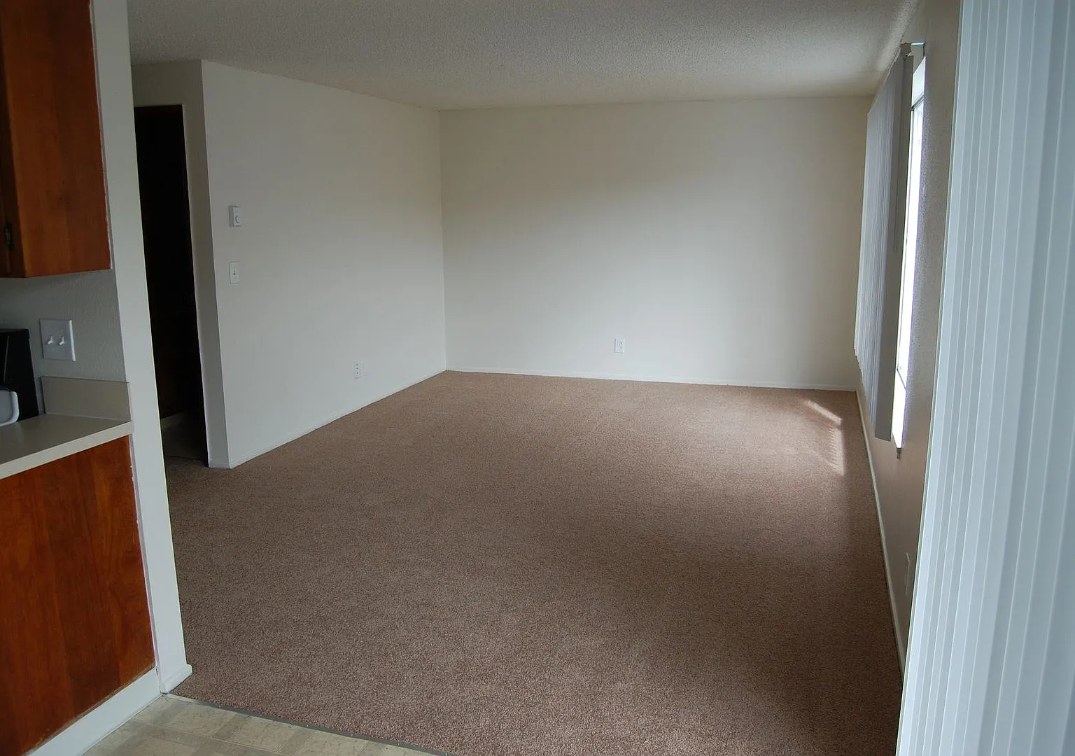 Spacious One & Two Bed Units in a Quite complex with Porches and Covered Off Street Parking — Photo 2