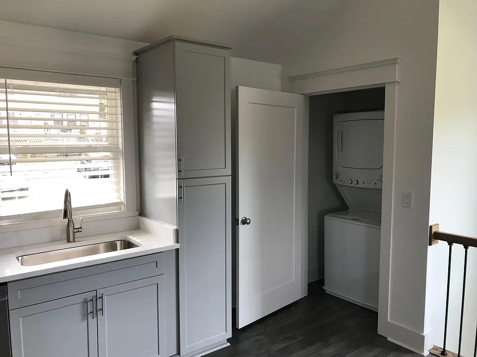 Stackable washer & dryer included. Picture window over the kitchen sink to provide natural light into the space.