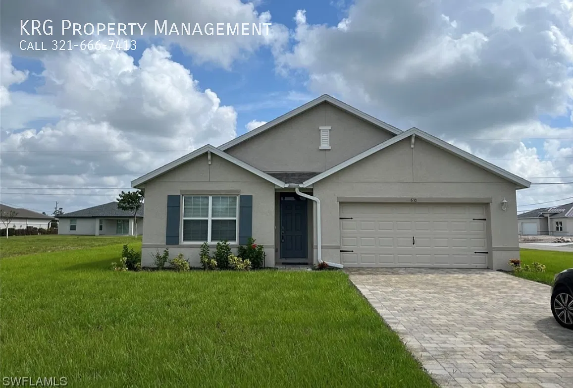 For Rent! Spacious 4-Bedroom Home In Cape Coral Lawn Care Included! — Photo 1