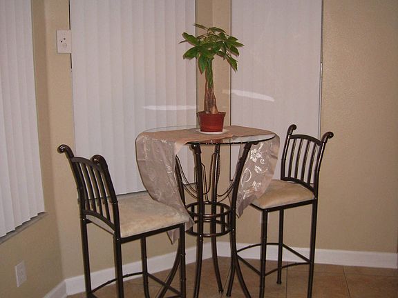 Breakfast Nook w/windows overlooking pool area