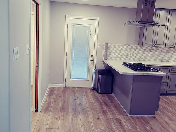 401 Cedar: Kitchen Area - Door to back patio / deck