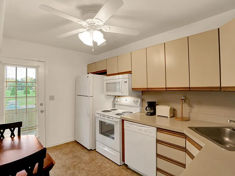 Classic unit kitchen - kitchens now come with black appliances