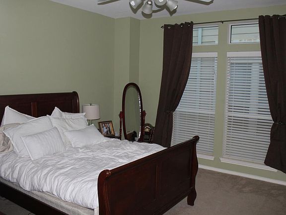 2nd floor bedroom has been updated with new paint and hardwood floors