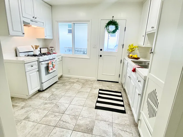Updated kitchen with a back door