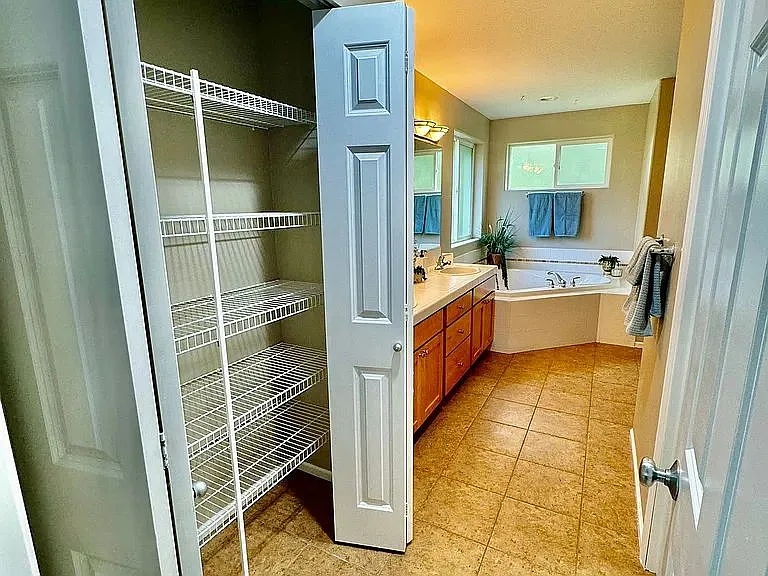 Master bedroom also has a large linen closet