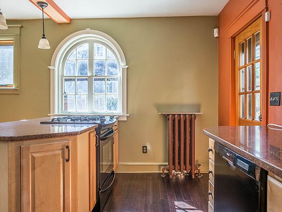 Door leads to private, back patio with gas grill.