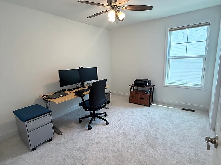2nd bedroom currently used as office. (Located to the left of staircase)