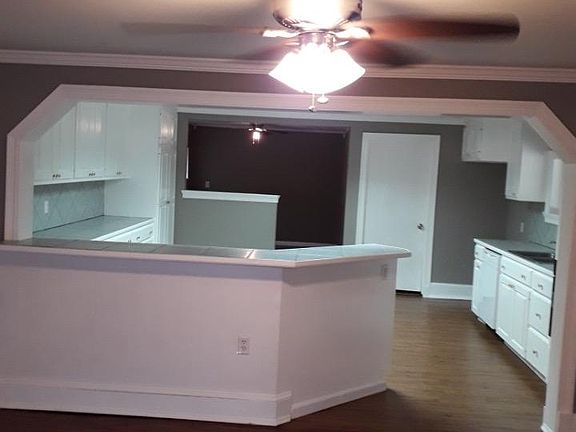 View from the living room into the kitchen.
