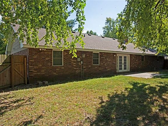 Beautiful Brick follows around the back of this home, opening into a great backyard space, accessible through beautiful French doors...