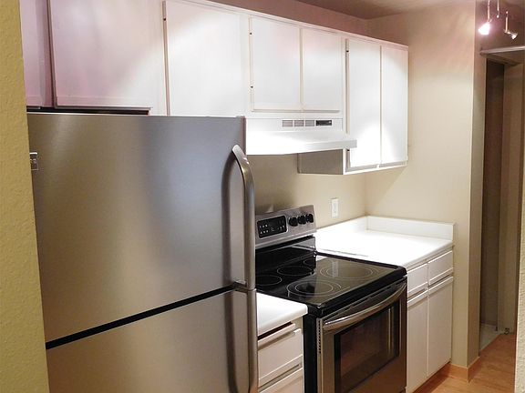 To the left of the entrance, we have the kitchen.