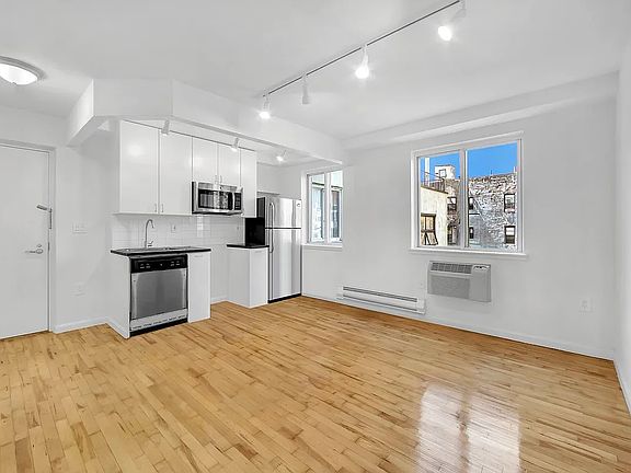 4th image of 319 E 8th St APT 2c