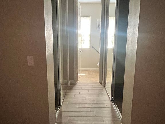 Hallway in Bedroom #1 with two closets