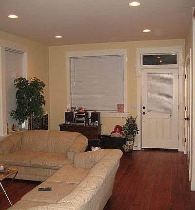 Guest house has elegant livingroom with beautiful hardwoods