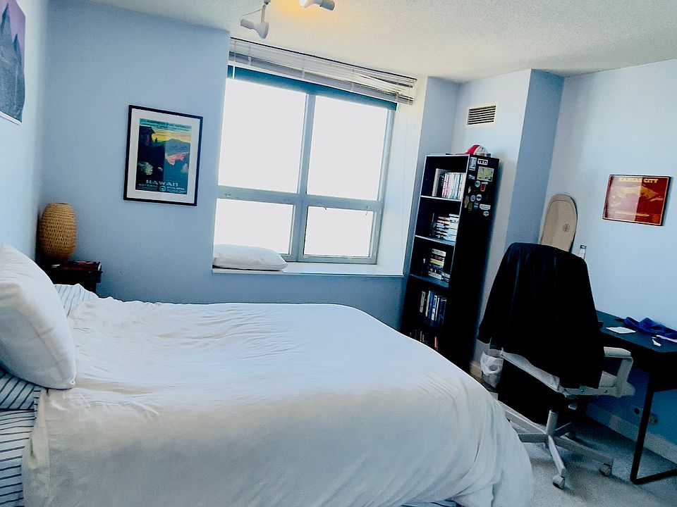 North bedroom with expansive horizon water and sky views
