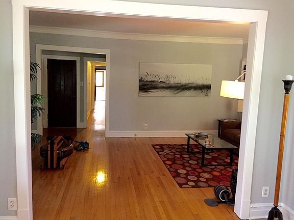 Large Living Room. Original wood floors, built in bookcases.