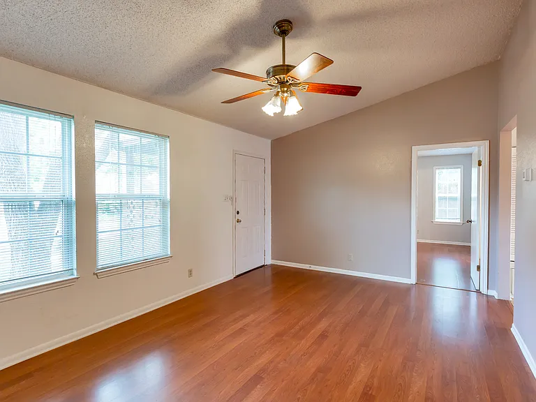 Front entry, living area. Doorway in background to bedroom 1