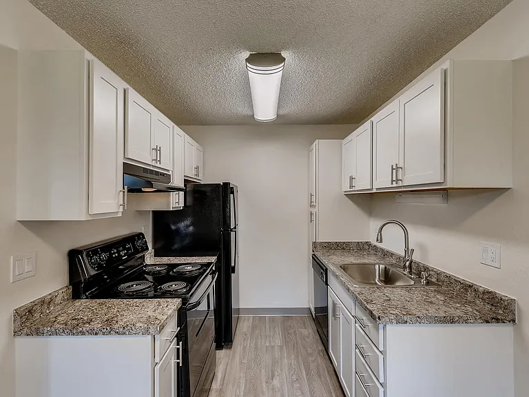 A Standard Kitchen at Morningtree Park Apartments