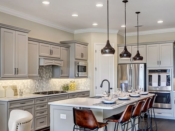 Kitchen with corner pantry